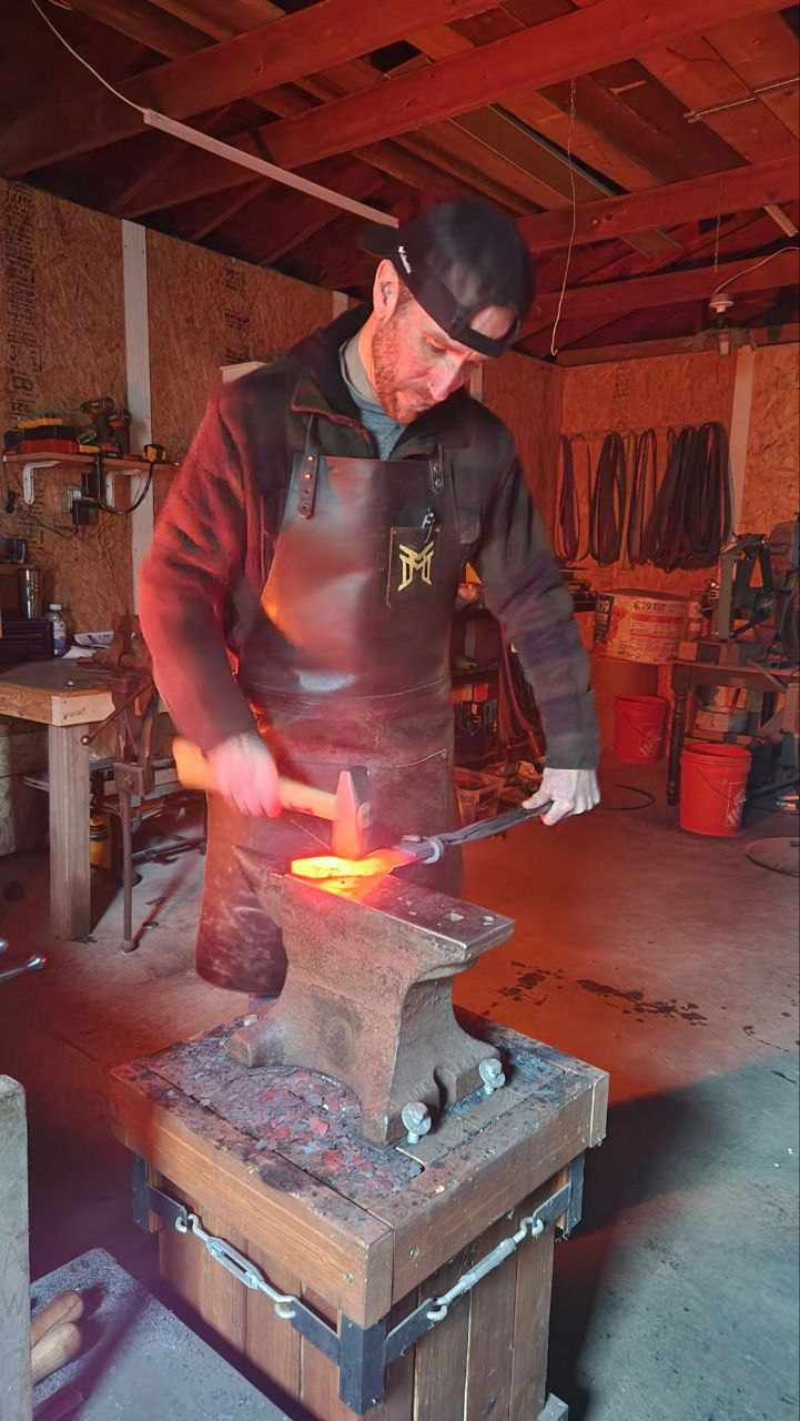 Kyle Tatsak at the forge